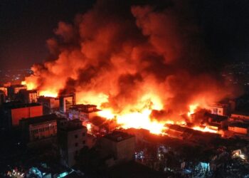 The mayor of Hargeisa said efforts to contain the blaze were hampered by problems of access in the market | AFP