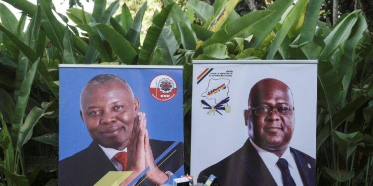 Posters of Vital Kamerhe, left, and Felix Tshisekedi during the 2018 presidential election campaign | AFP
