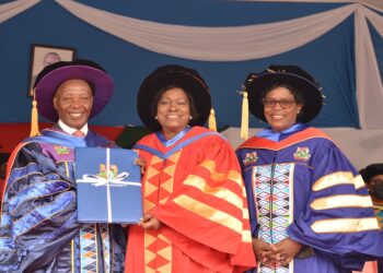 Kristina Wambui Pratt(center) receiving her Honorary Degree from Kenyatta University.Photo/Twitter