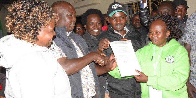 Rongai MP-Elect Paul Chebor(second left) receives his victory certificate.Photo/Courtesy