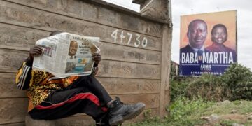 The race is currently too close to call between presidential frontrunners William Ruto and Raila Odinga (left on the billboard) | AFP