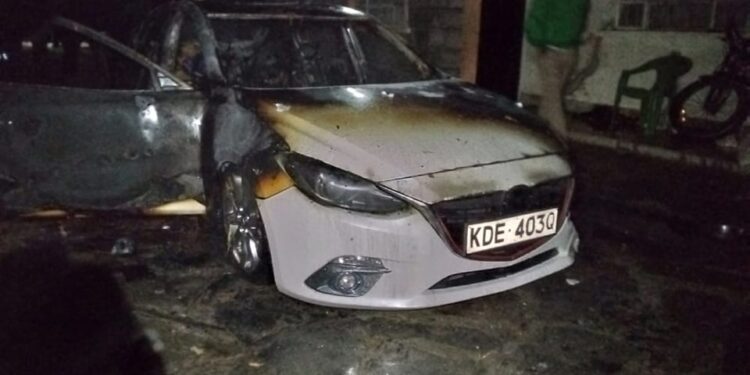 Philippe Sadja's vehicle was torched by the attackers.Photo/Courtesy