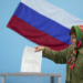 A woman votes in the controversial referendum in Donetsk, Ukraine on Sept. 27, 2022 |  Stringer/Anadolu Agency via Getty Images