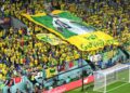 Brazilian fans showing a flag featuring football legend Pele saying 'Get well soon'
Photo: Courtesy