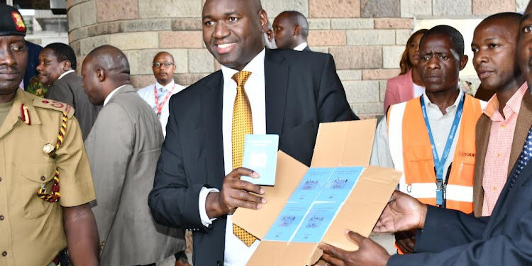 PS Bitok when he received passport booklets at Nyayo House, Nairobi. Photo/Courtesy