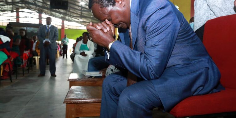 Wiper leader Kalonzo Musyoka praying during a past church service.
