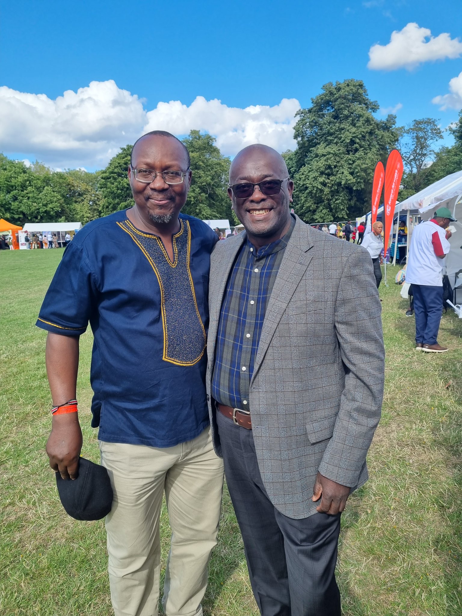 Ambassador Manoah Esipisu (left) with Manchester United's Chef Milton Isoyi at Kenya in the Park event on Saturday.