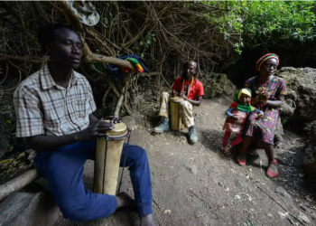 Rastafarians drum and sing during a special prayer and worship meeting at Menengai forest in Kenya. James Wakibia/SOPA Images/LightRocket via Getty Images