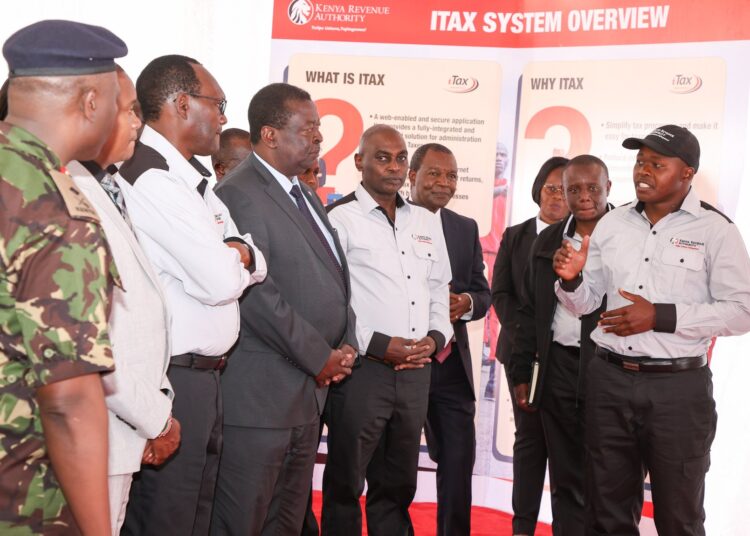 Prime CS Musalia Mudavadi with Treasury, KRA and KDF officials during the pass-out of Revenue Service Assistants. Wealth Tax 