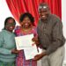 First daughter Charlene Ruto poses for a photo with her teacher (left) and examiner after graduating with a certificate in Kenyan Sign Language.