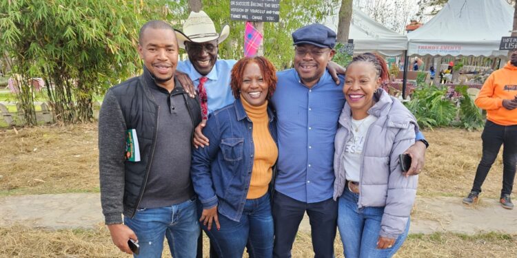 Citizen TV's presenter Fred Machokaa (in a white cap) poses for a photo with colleagues during the celebrations of his 70th birthday at his Isinya farm on Septmber 9, 2023.