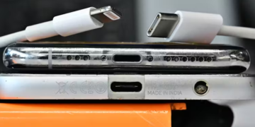 With pressure from the European Union, Apple has thrown in the towel on its Lightning connector, left, in favor of the standard USB-C, right. Frederic J. Brown/AFP via Getty Images