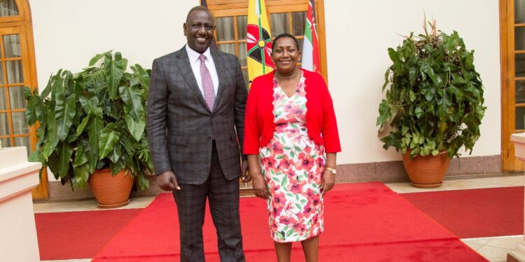 President William Ruto with Communications Authority Board Chairperson Mary Mungai.