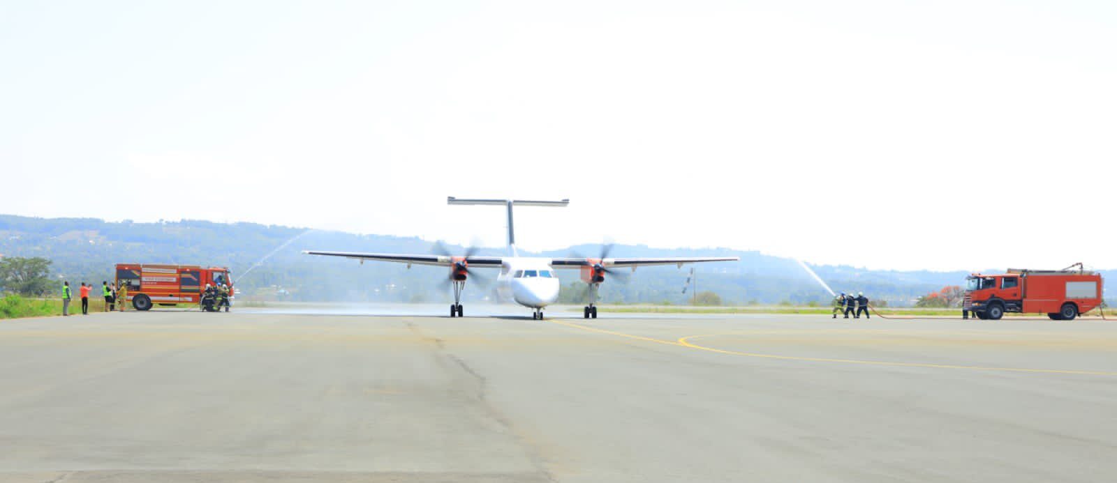 A Skyward Expresss aircraft receives the water salute after landing in Migori on September 13, 2023. 