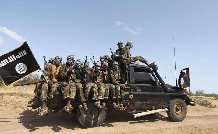 Members of the Al-Shabab group ride in a pick-up outside Mogadishu, Somalia in 2011. PHOTO/Reuters.