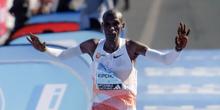 Kenyan marathon great Eliud Kipchoge crosses the finish in the Berlin Marathon. 