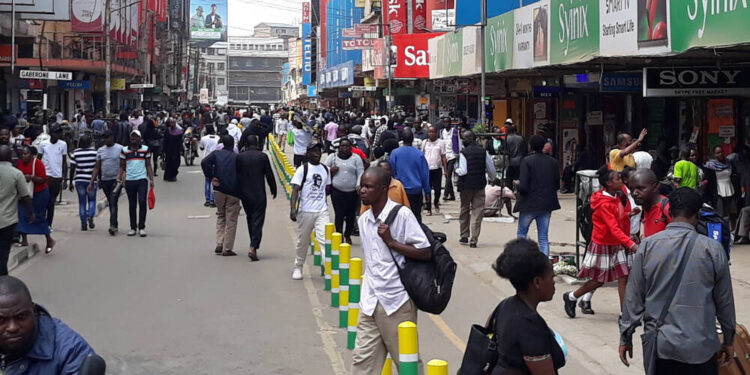 Kenyans going about their daily business in Nairobi CBD.