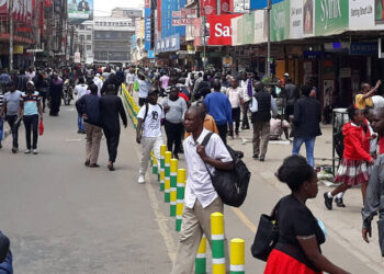 Kenyans going about their daily business in Nairobi CBD.