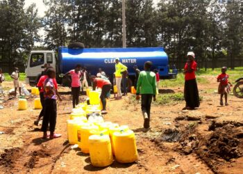 Photo of residents lining up for water in Bangladesh village, Nairobi.