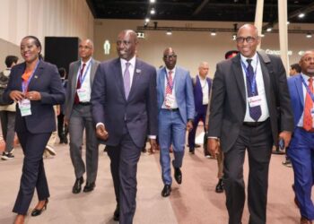 President William Ruto (second from left) leads Environment CS Soipan Tuya (left) and State House aide Adan Mohamed during the COP28 in Dubai.