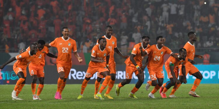 Ivory Coast Players celebrating their win against Defending champion Senegal.