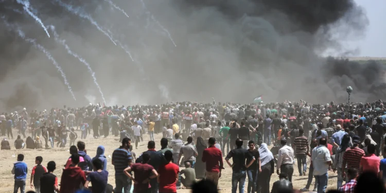 Waves of Israel vs.Gazans Tear Gas and Bullets