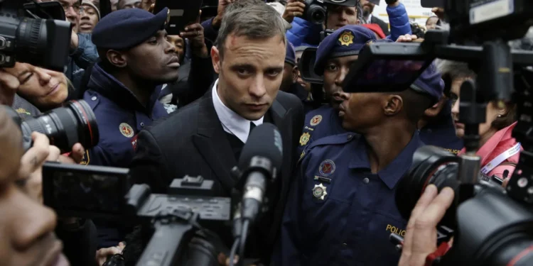 Oscar Pistorius leaves the High Court in Pretoria, South Africa, on June 14, 2016, during his trial for the murder of girlfriend Reeva Steenkamp.