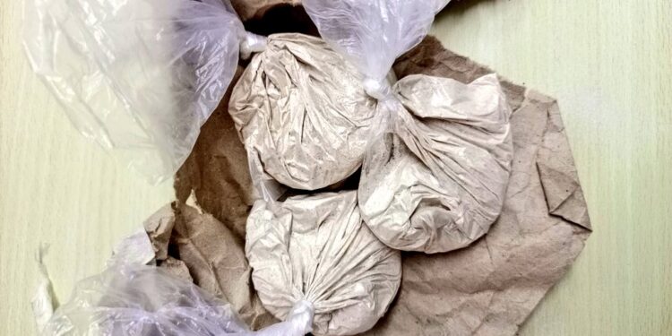 A photo of the heroin found by police in polythene bags in the students room. PHOTO/DCI.