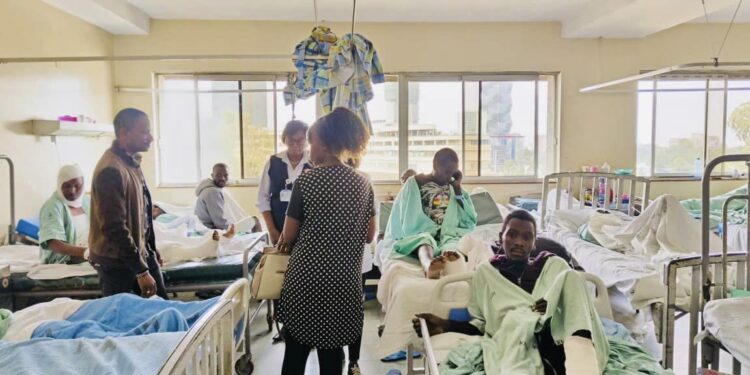 Embakasi East MP Babu Owino visits patients injured during the gas plant explosion. PHOTO/Babu Owino FB.