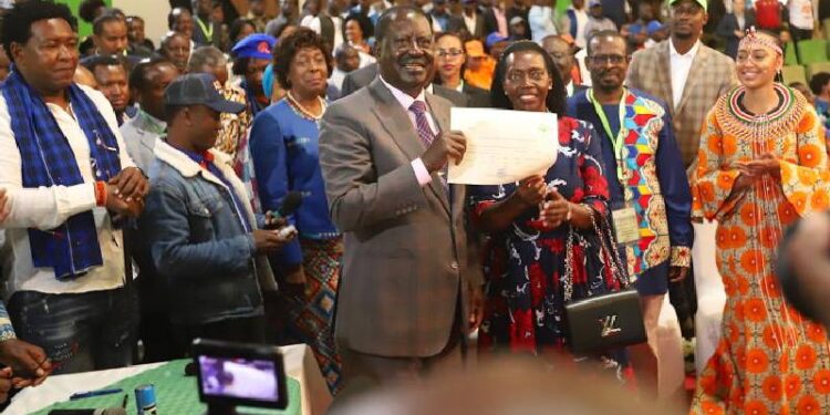 Azimio leader Raila Odinga with Martha Karua after receiving IEBC clearance to contest for the 2022 presidential elections. PHOTO/Courtesy.