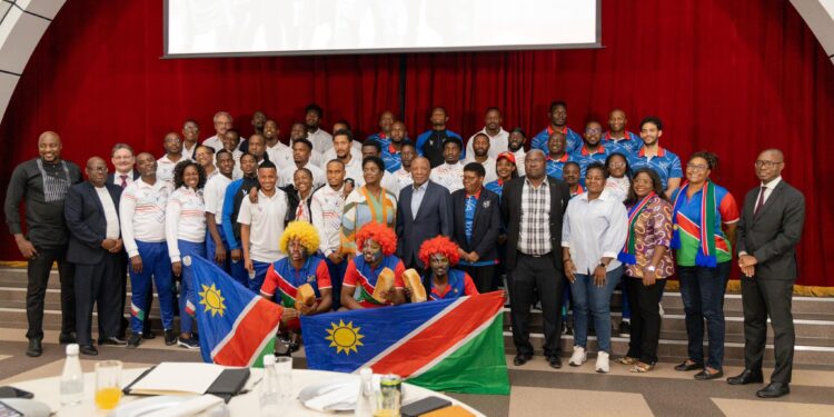 Namibia's Vice President Dr Nangolo Mbumba with national soccer team after AFCON tour. PHOTO/Courtesy. 