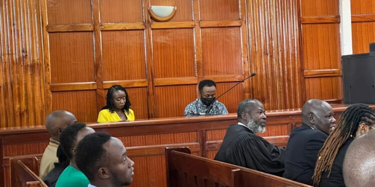 Jacque Maribe (left) and Jowie Irungu follow court proceedings.