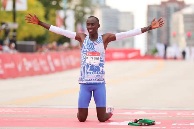 World Marathon Record Holder Kelvin Kiptum celebrates afterc winning the 2023 Chicago Marathon. 