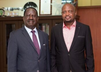 Azimio leader Raila Odinga with Public Service CS Moses Kuria. PHOTO/Courtesy.
