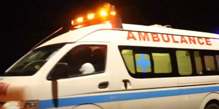 An ambulance at an accident scene. 