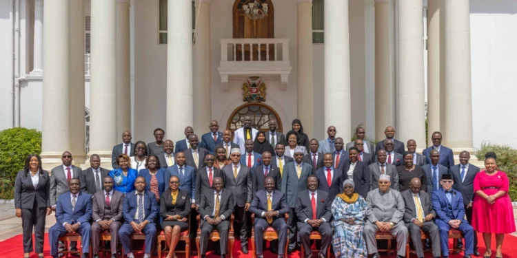 President William Ruto poses for a photo with newly appointed CASs during their swearing in. 