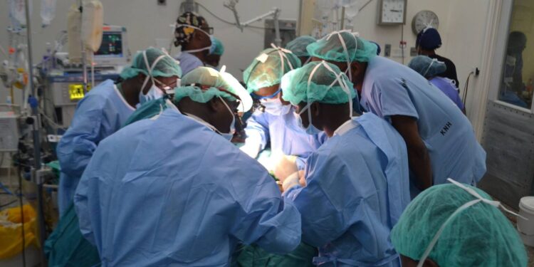 Medics during a procedure at Kenyatta National Hospital. PHOTO/Courtesy.