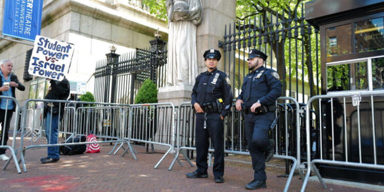 New York City Police NYPD officers stand near the entrance of Columbia University on May 1, 2024. PHOTO/ Courtesy