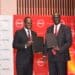Absa Bank Kenya MD & CEO Abdi Mohamed and Old Mutual East Africa Group CEO Arthur Oginga officially launch the Linda Biz SME bundled insurance solution. PHOTO/ ABSA